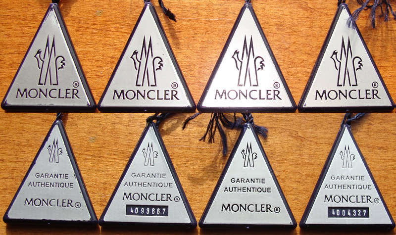 moncler triangle tag